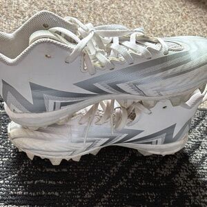 White Adidas cleats